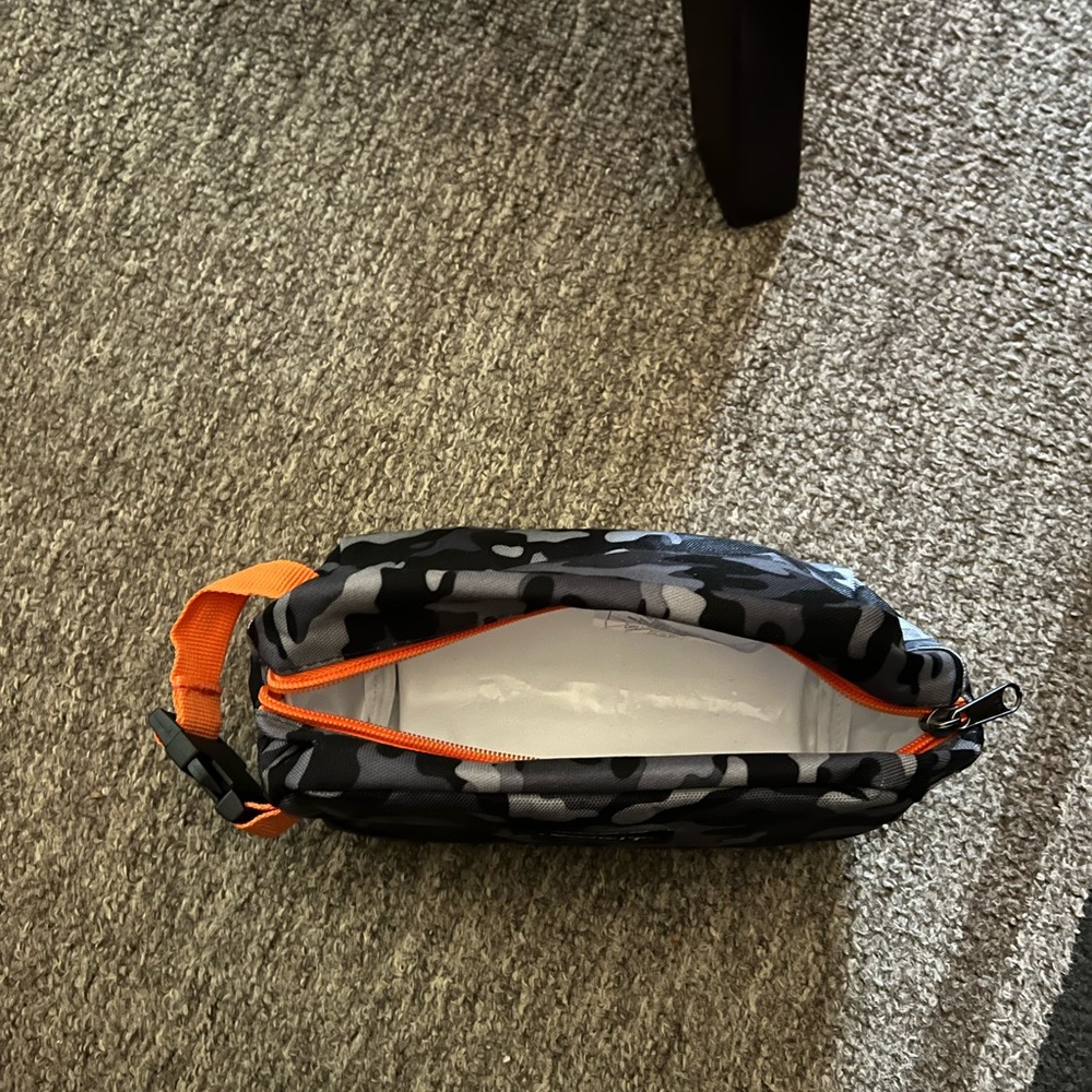 Army grey, black and orange. Just found the other item. Excellent for fishing.